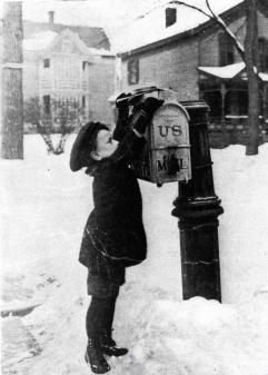 Young boy does his best to put his letters into a Doremus-style mailbox.. 1880. Smithsonian Institution, USA. . Web. 8 Aug. 2014.